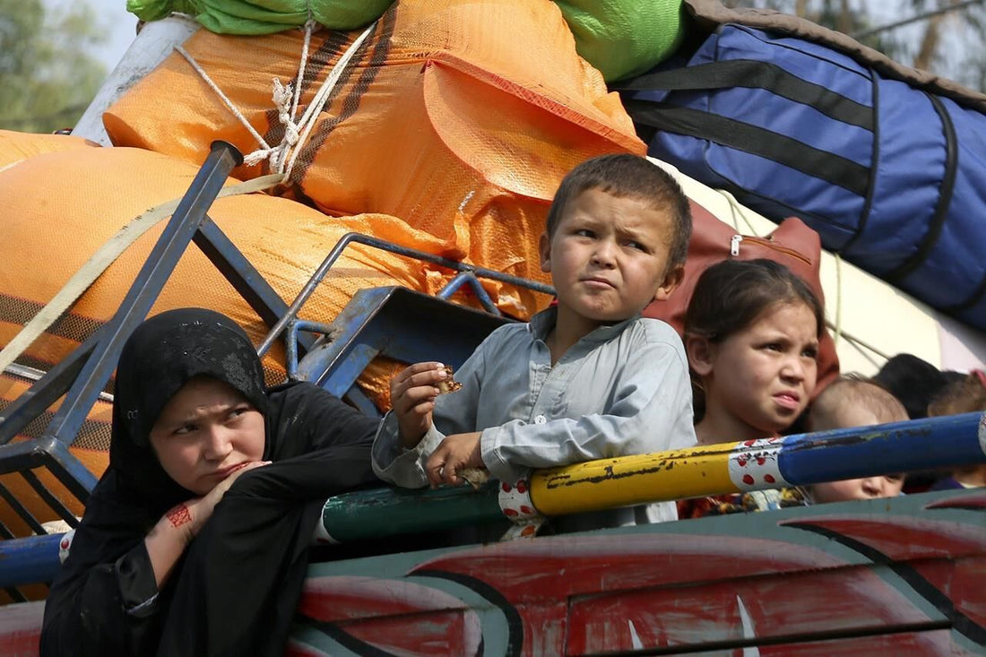 Afghans in droves head to border to leave Pakistan ahead of a deadline in anti-migrant crackdown