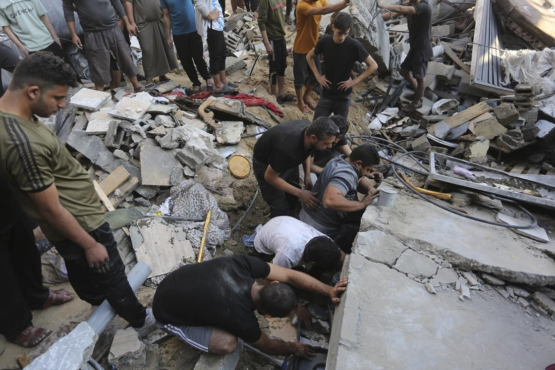 Israeli airstrikes crush apartments in Gaza refugee camp, as ground troops battle Hamas militants