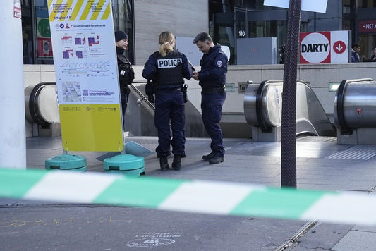 Paris police open fire on a woman who allegedly made death threats in the latest security incident